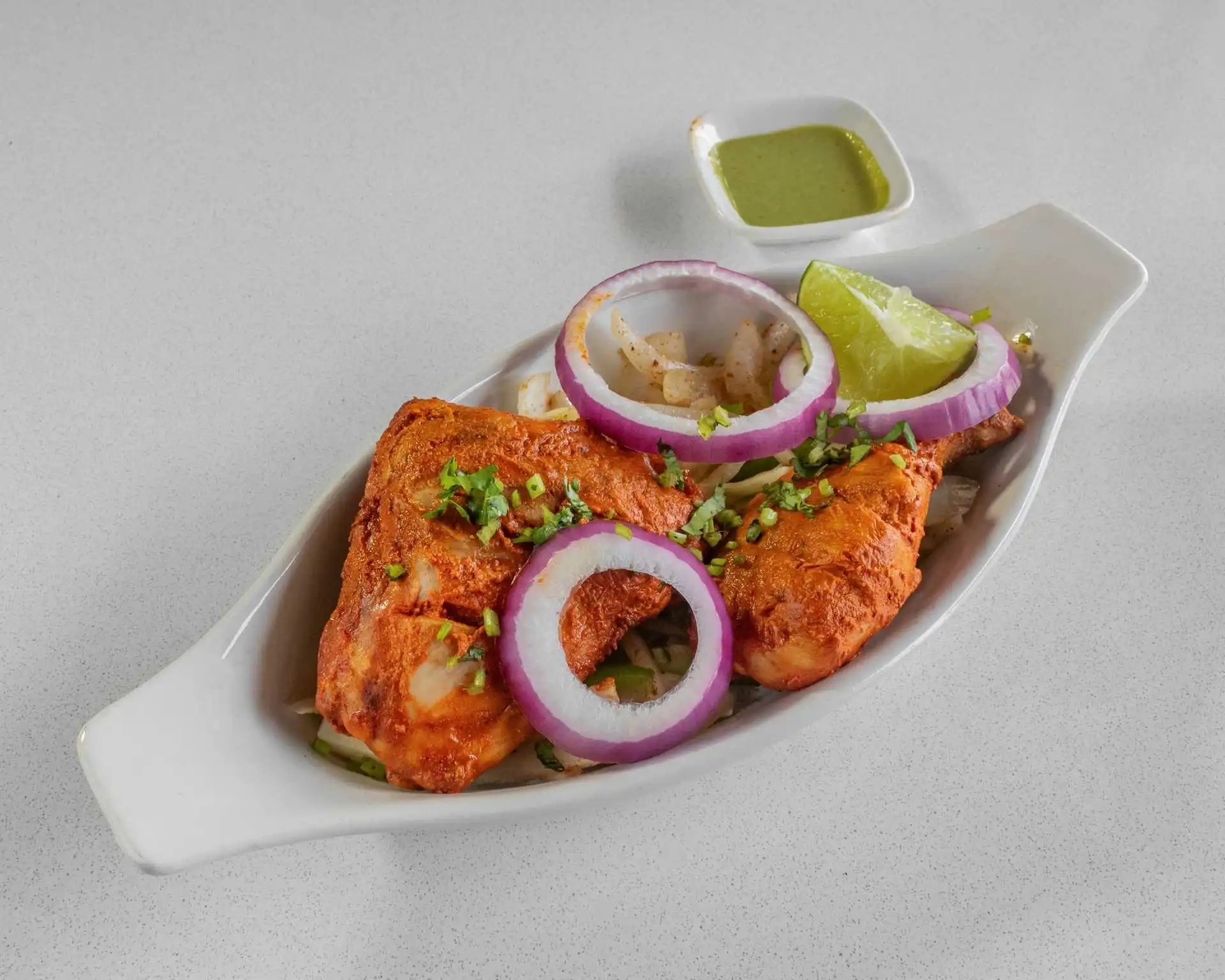 Oven-roasted chicken with dipping sauce, a popular side for pizza and wings delivery from Samra Pizza in NW Calgary